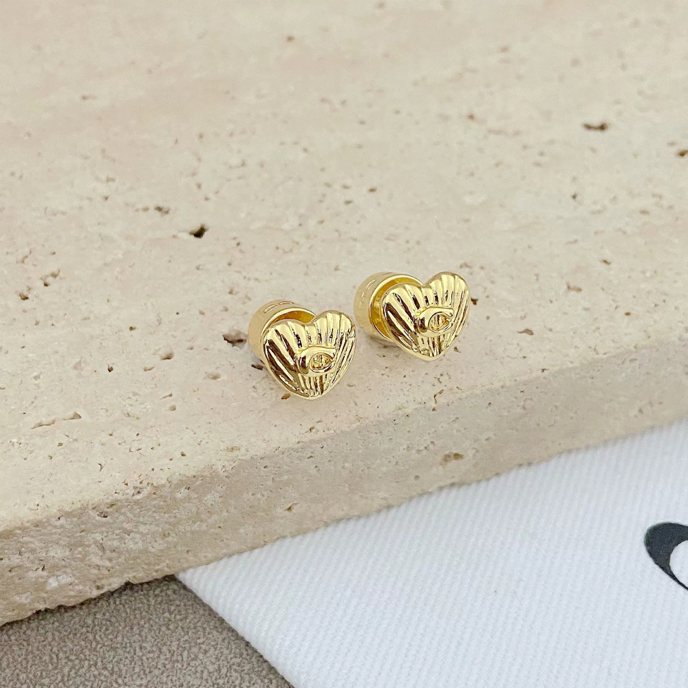 Coach stainless steel stud earrings vintage